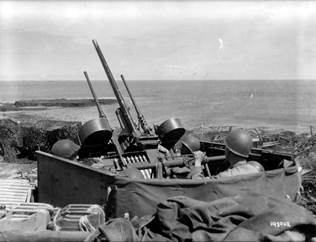 A half-track shooting at several aircraft after Normandy.